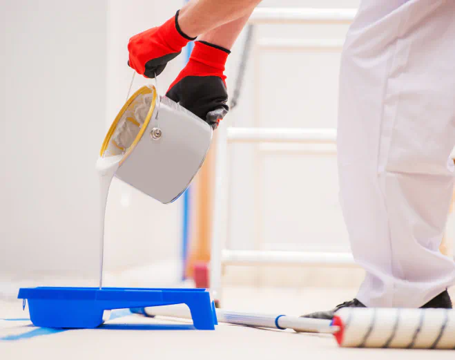worker preparing paint